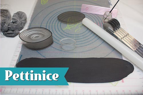 Mix 150g Black Pettinice fondant with 1/2tsp of tylose and roll out thinly.