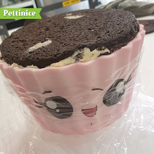 Continue stacking and filling your cakes until full.  Trim cakes to size as needed and save your offcuts.