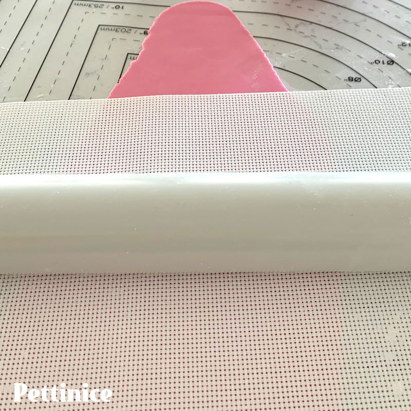 32. Roll the darker pink to about 2mm thick. You can add interest by rolling with a texture mat if you like. I have a variety of drawer liners from the ‘$2 Shop’ that have wonderful textures. This is a woven look but you might choose to add stripes or hearts or flowers. Anything goes!