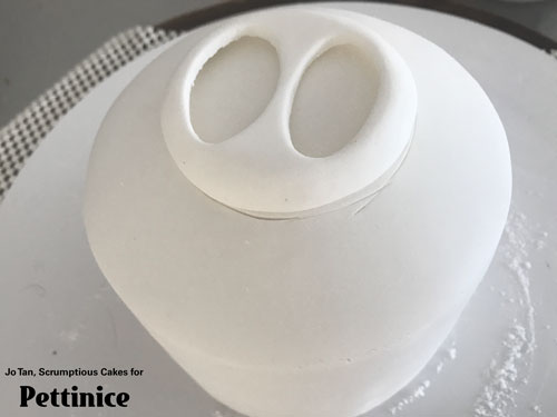 I cut 2 ovals out using an Exacto knife – oval cutters would probably give you a cleaner look.